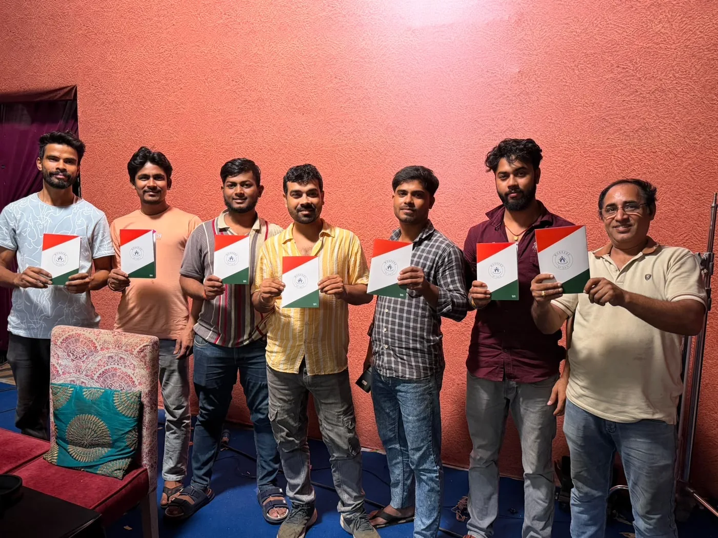 Camera and support crew at Film City with the Hindi awareness booklet